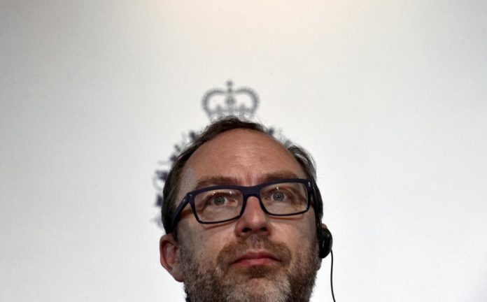 Wikipedia co-founder Jimmy Wales addresses a news conference in Oviedo